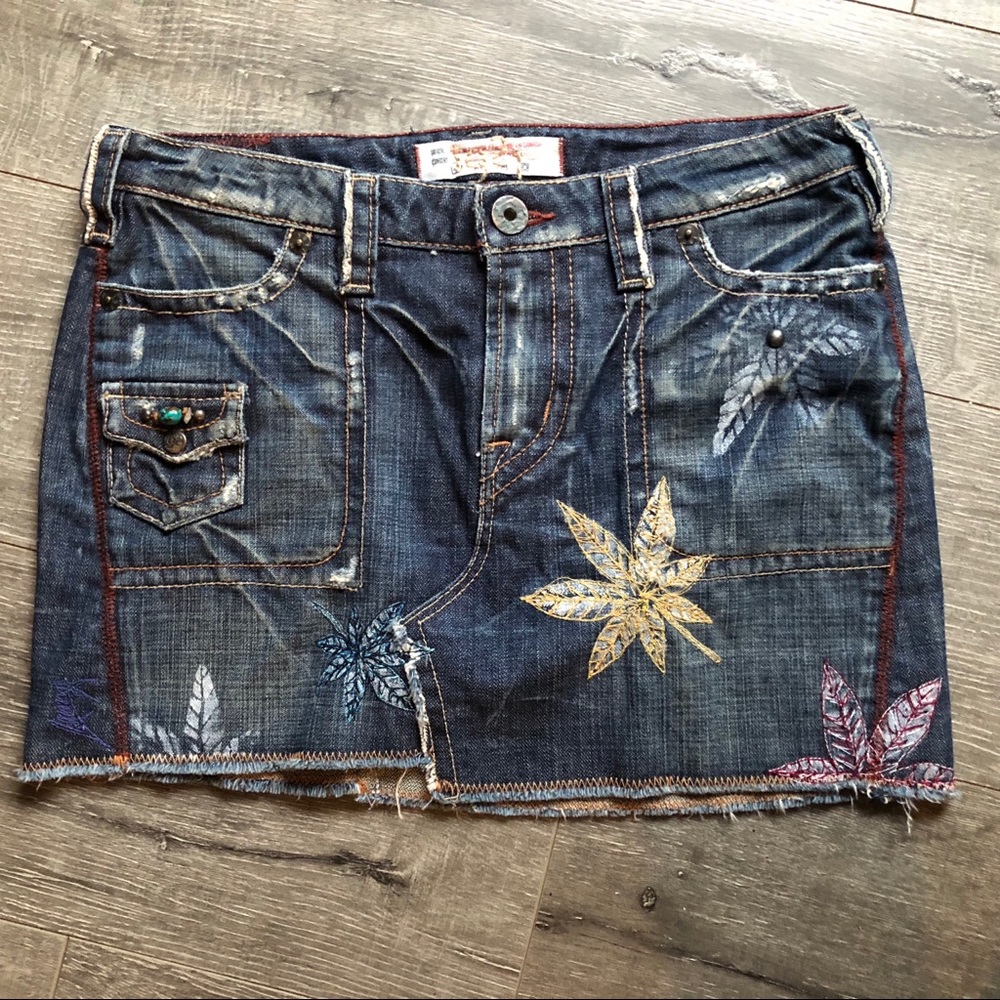 Denim & Lace Mini Skirt With Gold Metal Centered Flower Embroidery